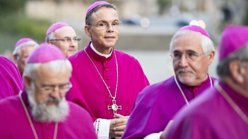 Tebartz-van Elst walks with clergy at the German Bishops' Conference in Fulda, Germany, on September 26.