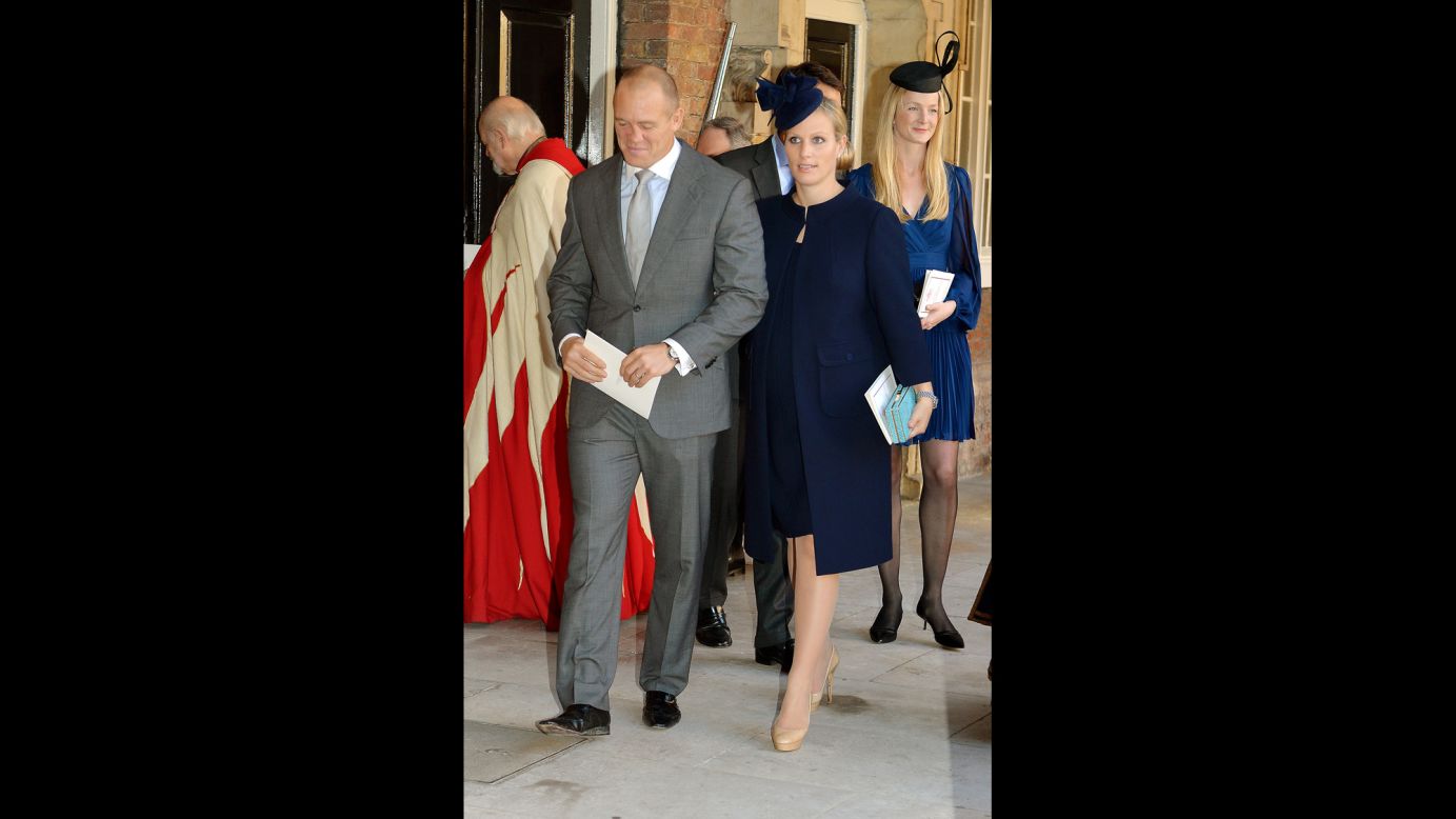 Godparent Zara Philips and husband Mike Tindall leave the palace.