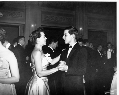 1958: Mary Haskell, 49, with her son, Chevey, 13, at a debutante ball.
