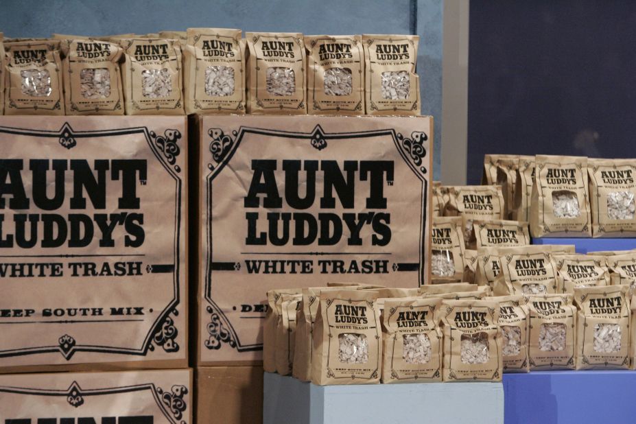 Aunt Luddy's White Trash is a snack sold at Walton's Fancy and Staple, a gourmet deli and bakery in Austin, Texas, owned by actress Sandra Bullock. 