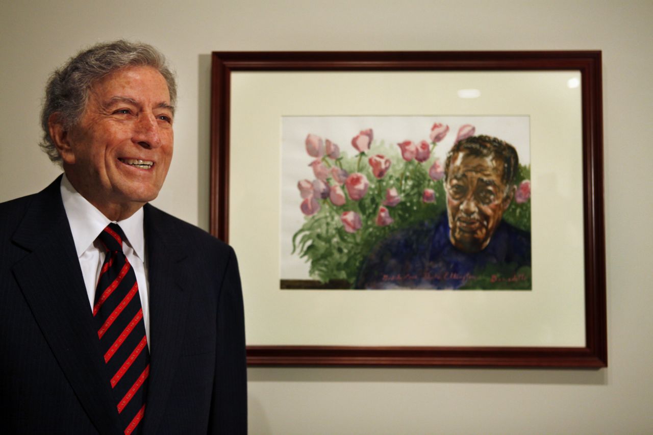 Before he was a singer, Tony Bennett was a painter. He still is, and a successful one, too: His paintings sell for $10,000 or more. "When I'm not painting, I often go up to the Metropolitan Museum of Art on Fifth Avenue for inspiration, to see how the greats solved problems," <a href="http://online.wsj.com/news/articles/SB10001424052702304520704579127372375255730" target="_blank" target="_blank">he wrote in The Wall Street Journal</a>. Here, Bennett presents a watercolor painting he did of Duke Ellington to the National Portrait Gallery in Washington in 2009.