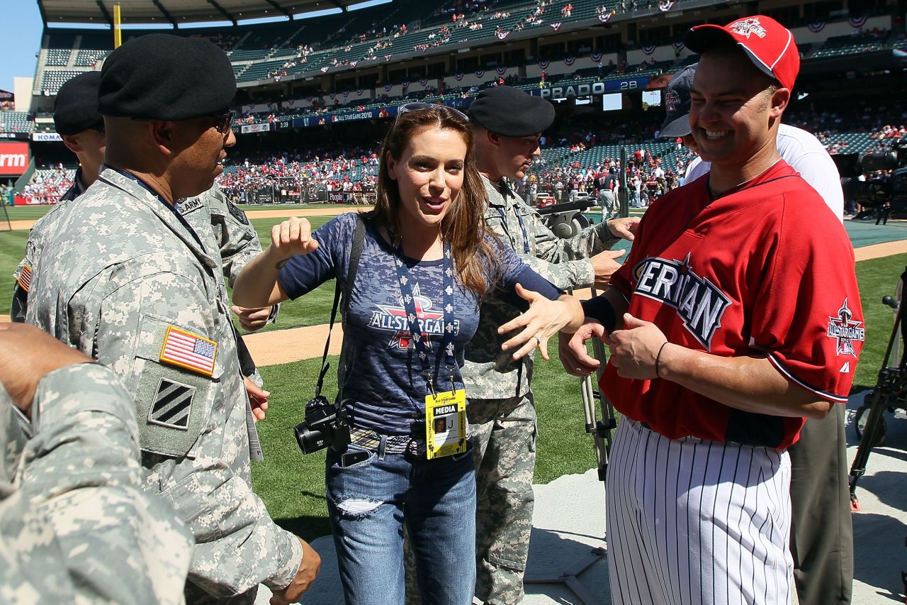 Alyssa Milano is a huge baseball fan and doesn't mind if everybody knows. She's written a book about her love for the sport, "Safe at Home," and has contributed columns and interviews to variety of media.
