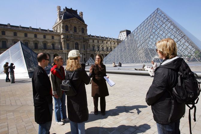 The Louvre is a beautiful place ... for scam artists. Tour guides can help you spot them. Hmm. That guy look kind of sketchy to you?