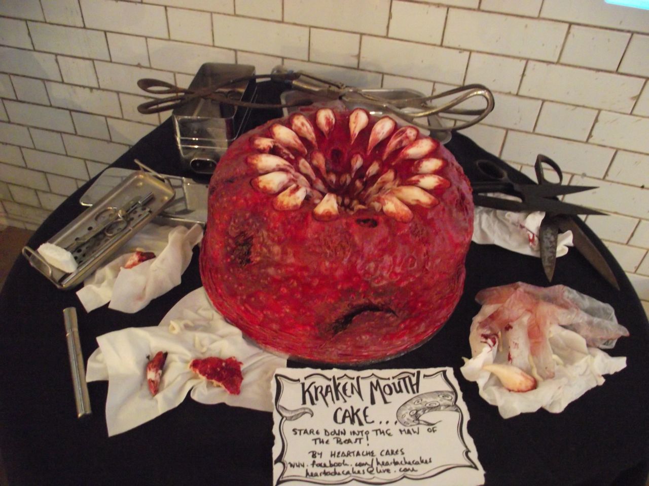 Gaze into the Kraken's mouth. This cake is actually a spiced cake with cinnamon and nutmeg made by <a href="https://www.facebook.com/HeartacheCakes" target="_blank" target="_blank">Heartache Cakes</a>.