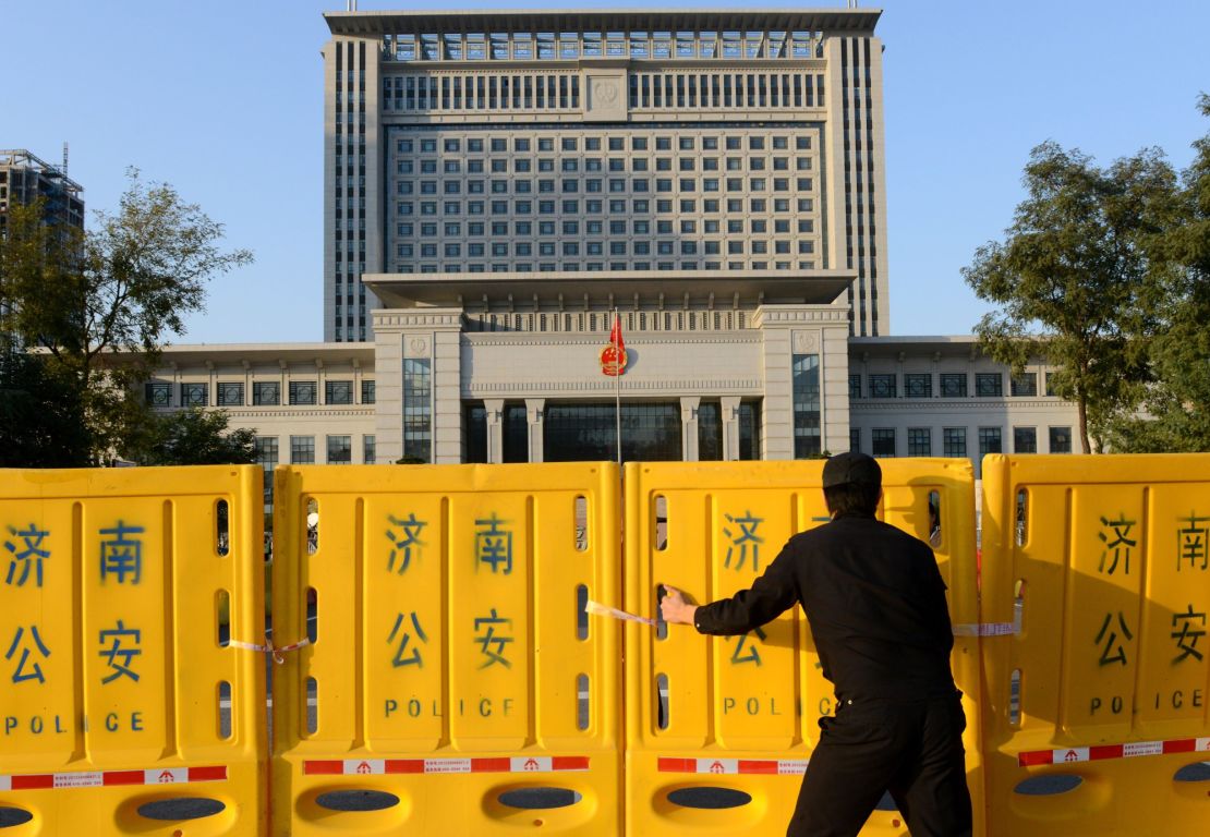 Barricades get erected outside a court in Jinan in  2013 in preparation for a ruling on an appeal by ex-political star Bo Xilai. 