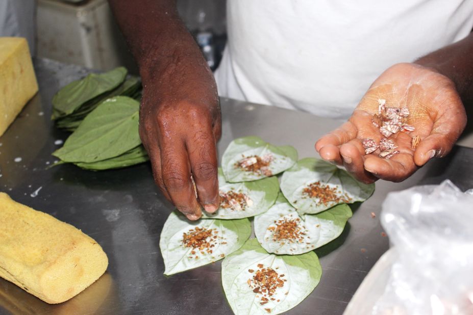 Areca "nuts" are added to the parcel, though they're not really nuts. They're seeds that come from the areca palm, which is grown throughout Asia.