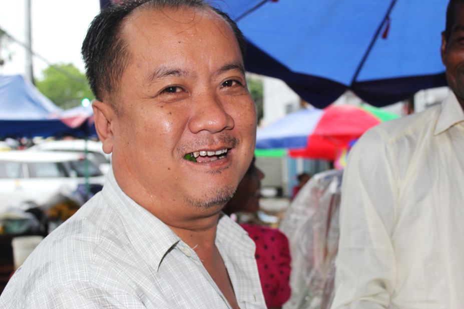 Taxi driver U Sein, 37, is a happy customer. He chews around 10 betel quids a day. He says he doesn't smoke and that quids are "better for me."