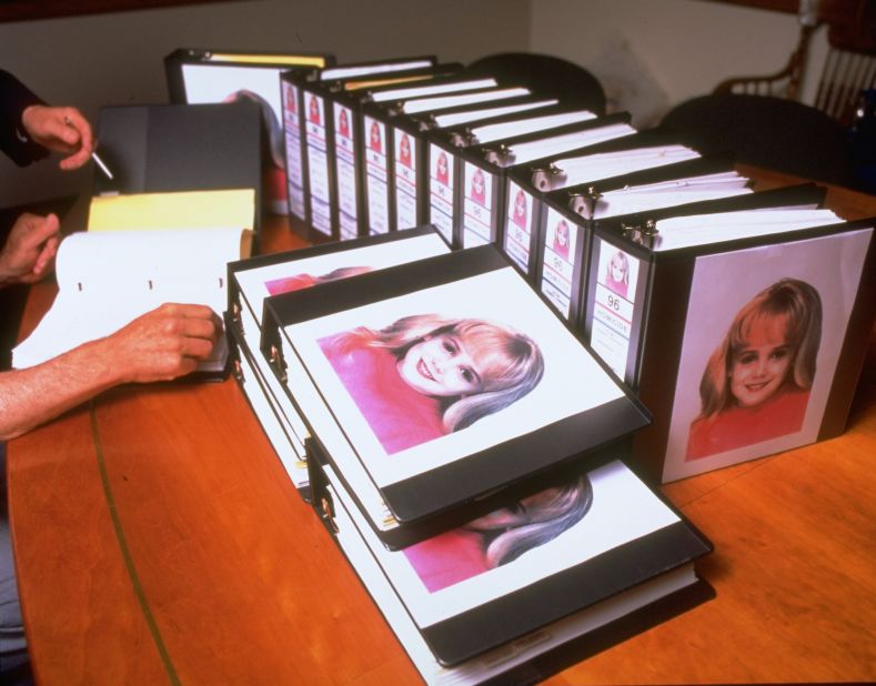 Binders were crammed with investigators' reports in the JonBenet case. Reports revealed that her skull had been fractured and the ransom note came from a notepad from the Ramsey's home. 