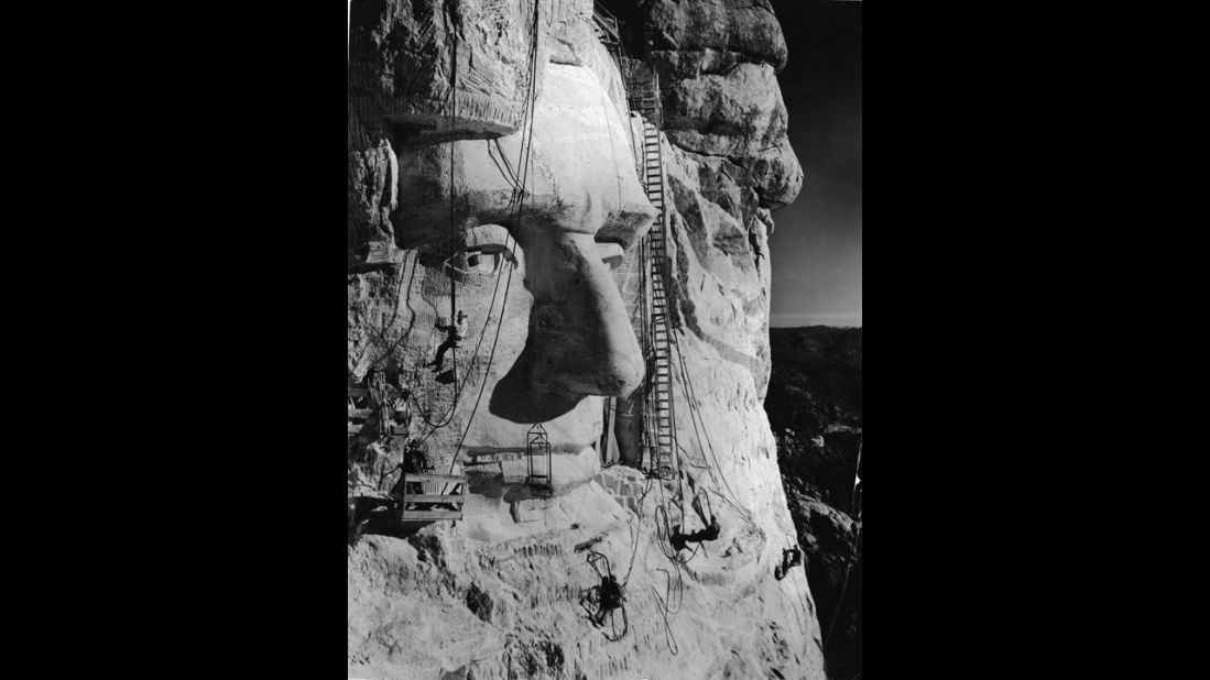 In 1927, American sculptor Gutzon Borglum began work on carving Mount Rushmore in Keystone, South Dakota. Borglum is pictured here -- along with several members of his crew in the 1930s -- below the eye of President Abraham Lincoln.