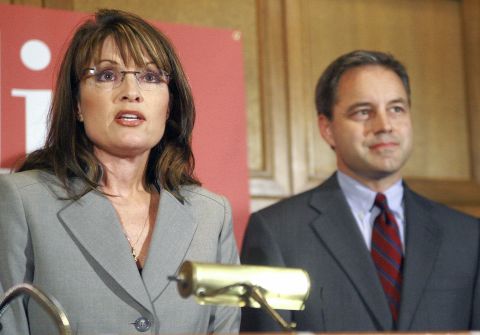 Palin stands beside then-Republican candidate for lieutenant governor Sean Parnell in September 2006 as they talk about their plan for a natural gas pipeline during a news conference in Anchorage, Alaska. Parnell became governor when Palin stepped down in 2009.