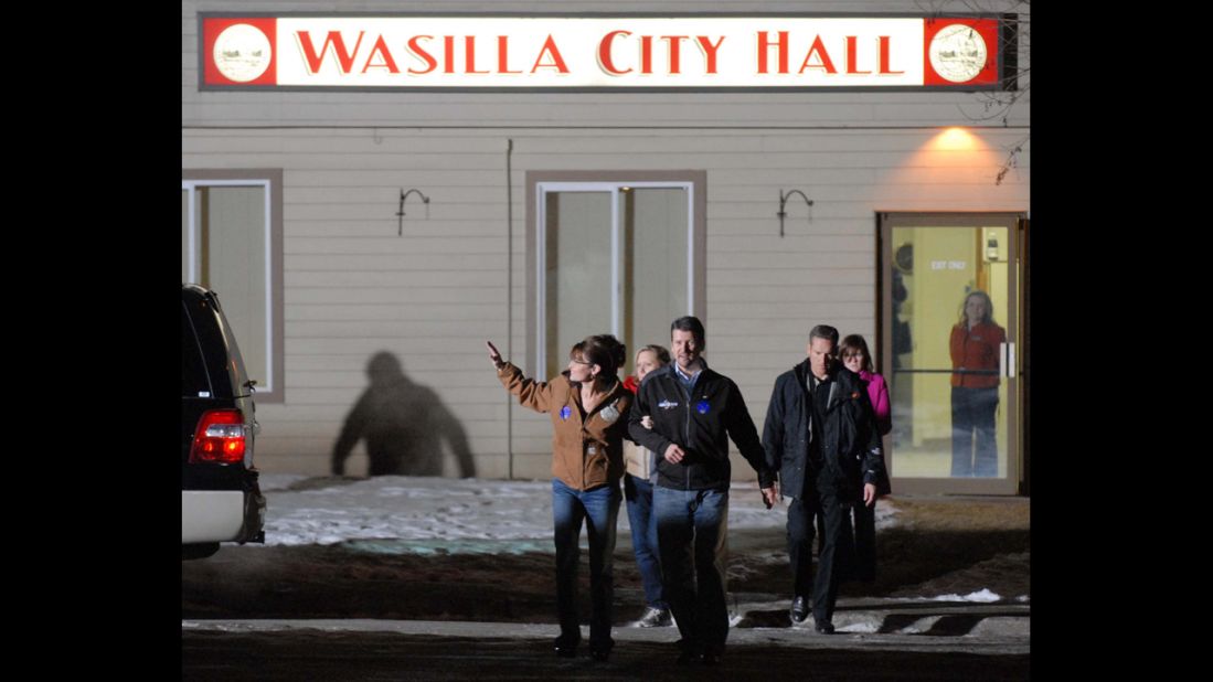 Palin and her husband leave City Hall after she voted in her hometown of Wasilla, Alaska, in November 2008. The Palins then flew to Arizona to join McCain.