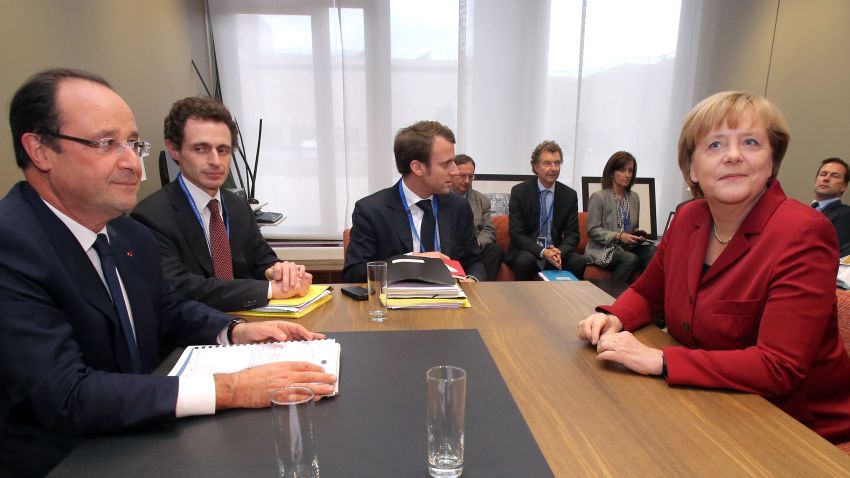 German Chancellor Angela Merkel (R) and French President Francois Hollande hold a bilateral meeting on October 24, 2013 on the sidelines of a EU summit at the EU headquarters in Brussels. German Chancellor Angela Merkel, reportedly the target of US snooping on her mobile phone, said on October 24 that such conduct between friends was unacceptable. AFP PHOTO / POOL / Michel Euler (Photo credit should read MICHEL EULER/AFP/Getty Images)