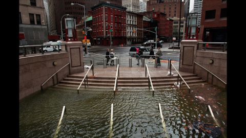 Water floods the Plaza Shops in New York City on October 30, 2012.