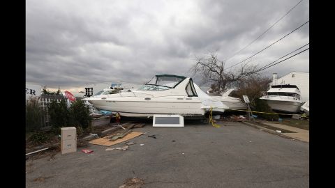  A boat from the Blue Water Club blocks Whaleneck Drive in Merrick, New York, on November 1, 2012.