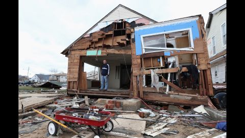 Gary Silberman surveys his destroyed home on October 31, 2012, in Lindenhurst, New York,