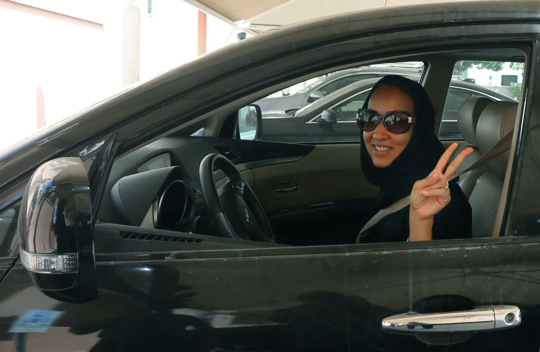 Saudi activist, Manal Al Sharif, drives her car in Dubai in October 2013 in defiance of the authorities to campaign for women's rights to drive in Saudi Arabia.