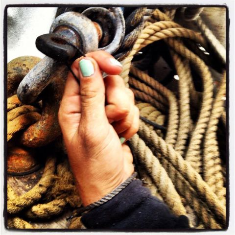 Hewitt nearly drowned because her tether to a shipmate got caught on sinking debris. She posted this Facebook photo of herself holding twine and ship's rigging. She captioned it, "Strong like seine twine." <br /><br />"It's hard when people say cruel things," Hewitt said, "like 'oh, Bounty, those reckless people' or 'they're loving the attention they get.' They don't see the side like when I had to interrupt my job conducting boat tours to go cry in a Porta-Potty."