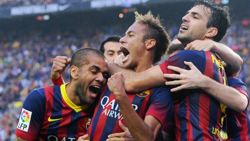 Neymar (center) celebrates scoring Barcelona's opening goal against Real Madrid at the Nou Camp.