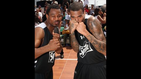 Pro boxer Shane Mosley, left, and Brown pose at the 2013 BET Experience in Los Angeles on June 29. 