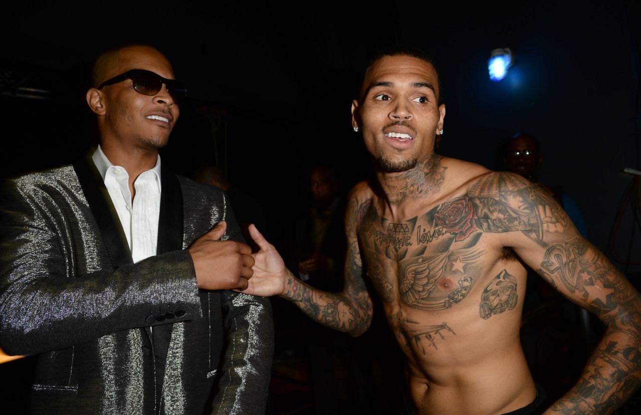 Recording artists T.I., left, and Brown attend the 2013 BET Awards in Los Angeles on June 30.