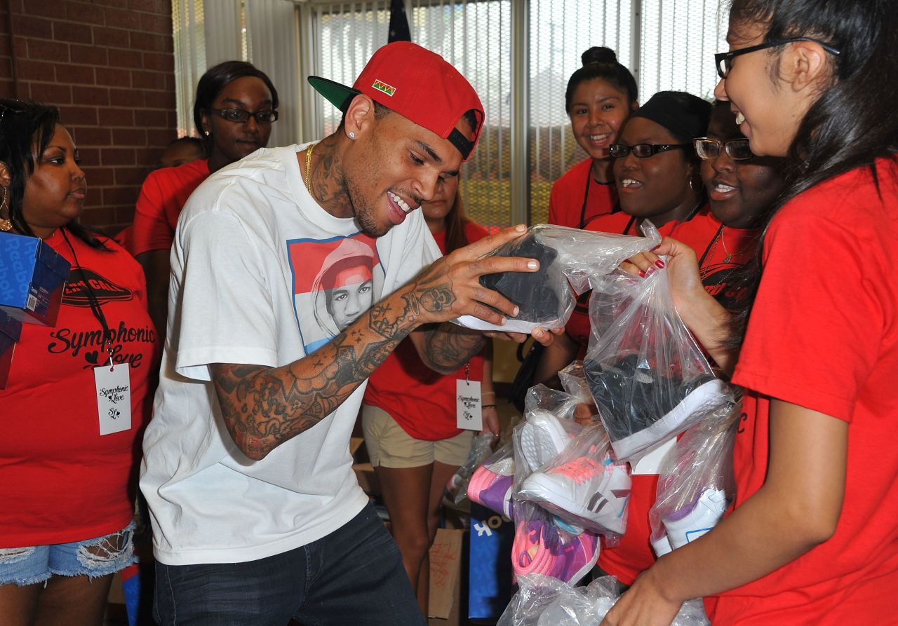 Brown greets fans in South Central Los Angeles on July 20.