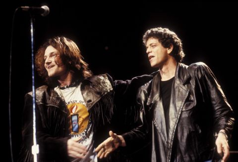 Bono of U2, left, and Reed appear at the Amnesty International Concert in Denver, Colorado, on June 8, 1986.