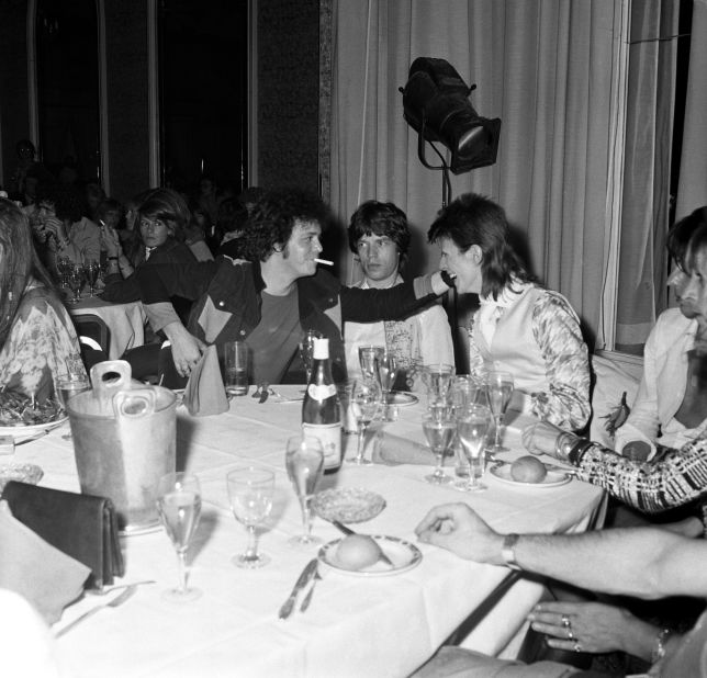Reed, Mick Jagger, center, and David Bowie, right, share a joke at a party at Cafe Royal thrown by Bowie on July 3, 1973.