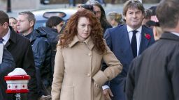 Former News International chief executive Rebekah Brooks arrives at the Old Bailey with her husband Charlie Brooks to hear the opening of the trial of conspiracy to hack phones at the Old Bailey on October 28, 2013 in London, England.