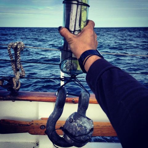 The message bottle, weighted with an iron shackle, is "the only way the message would get to them," Hewitt said. During the ceremony, Hewitt read aloud from sailing poems by Henry Longfellow and Walt Whitman's "Passage to India," including, "For we are bound where mariner has not yet dared to go / And we will risk the ship, ourselves and all."