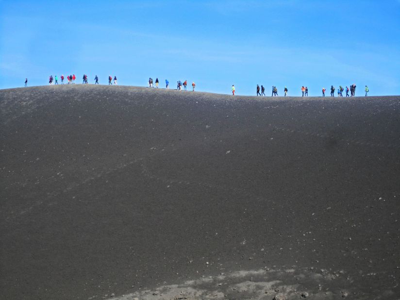 It's possible to hike up Etna. But guided trips to the ridge of the crater -- which include cable car, 4x4 bus and a short guided walk -- take about two hours total.