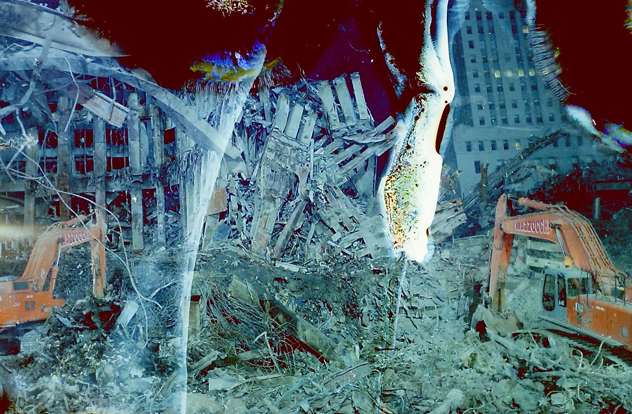 His partially destroyed photographs encapsulate two traumatic events burned in the minds of New Yorkers.