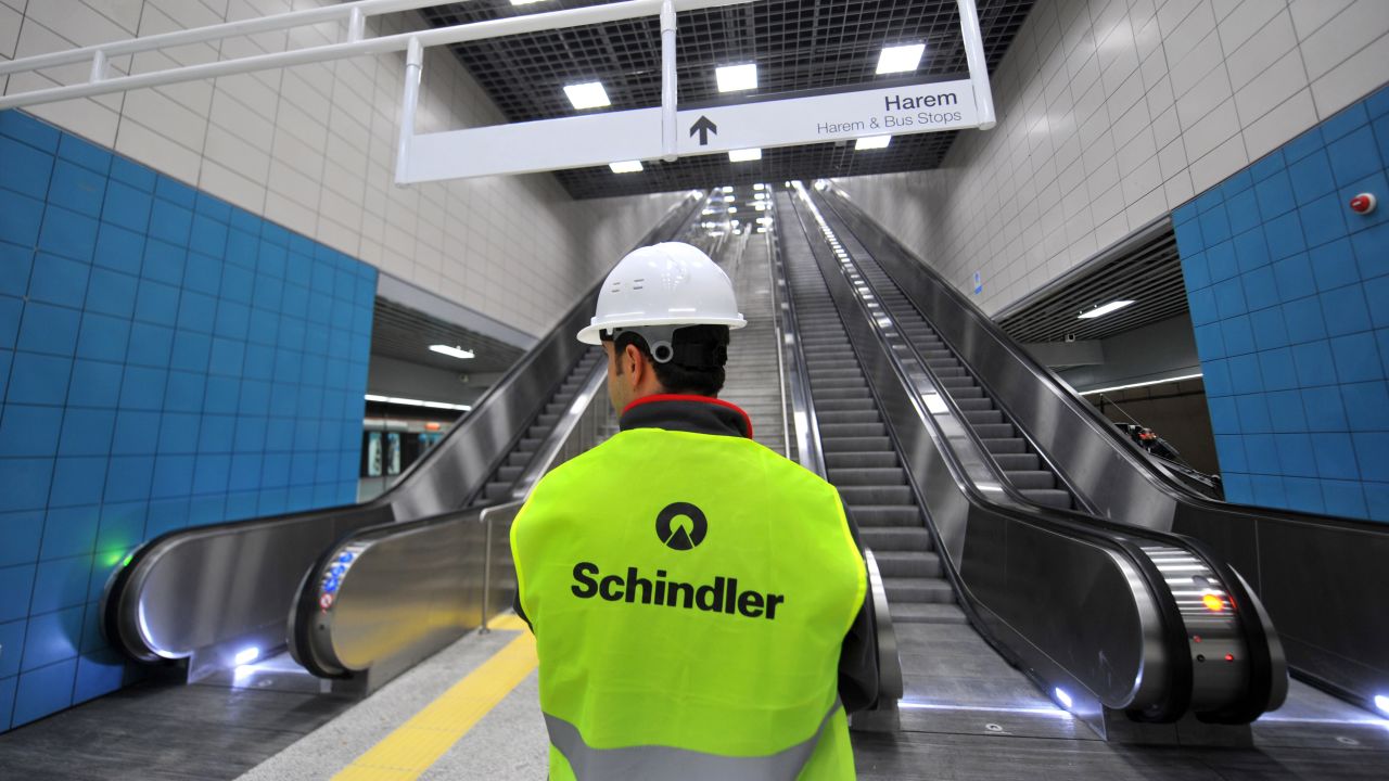 A worker stands next to escalators Monday at the Uskudar Marmaray station in Istanbul. The rail system is expected to have a capacity of 1.5 million people a day, connecting Europe and Asia in about four minutes.