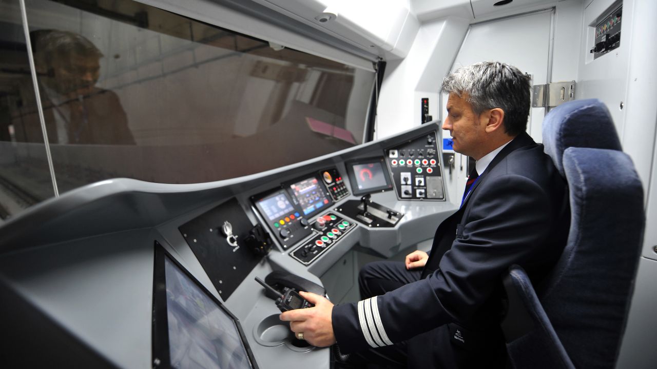 A driver inspects a train before the opening. The Marmaray project, part of the Turkish government's plan to expand the country's economy, cost $4.5 billion.