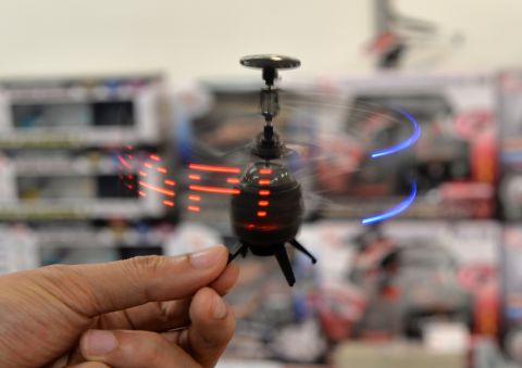 Japanese toy maker Kyosho has developed an infrared controlled drone 'Neon Messenger', which can display LED messages while flying.