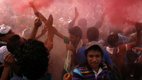 Student supporters of ousted Egyptian leader Mohamed Morsy light up a flare as they demonstrate outside al-Azhar university in Cairo on Oct. 28, 2013. 