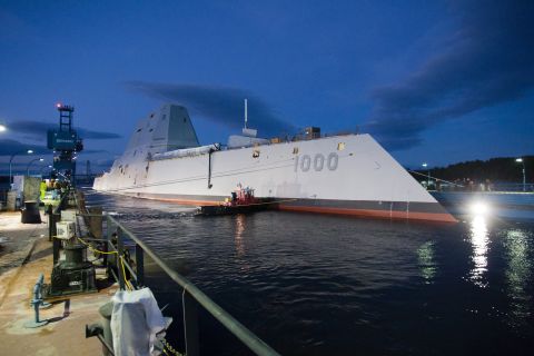 The USS Zumwalt, the U.S. Navy's newest warship, floats out of dry dock Monday, October 28, in Bath, Maine. The first of the new <a href="http://security.blogs.cnn.com/2013/10/29/bigger-faster-deadlier-navy-launches-new-stealth-destroyer/">DDG-1000 class of destroyers</a>, it will be the Navy's largest stealthy ship when it begins missions.
