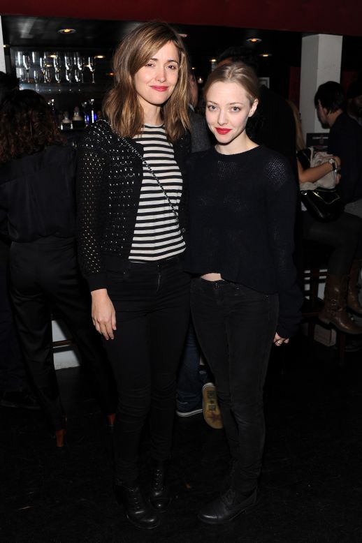 Rose Byrne and Amanda Seyfried are a chic pair in all-black at the LAByrinth Theater Company's Celebrity Charades benefit in New York on October 28.