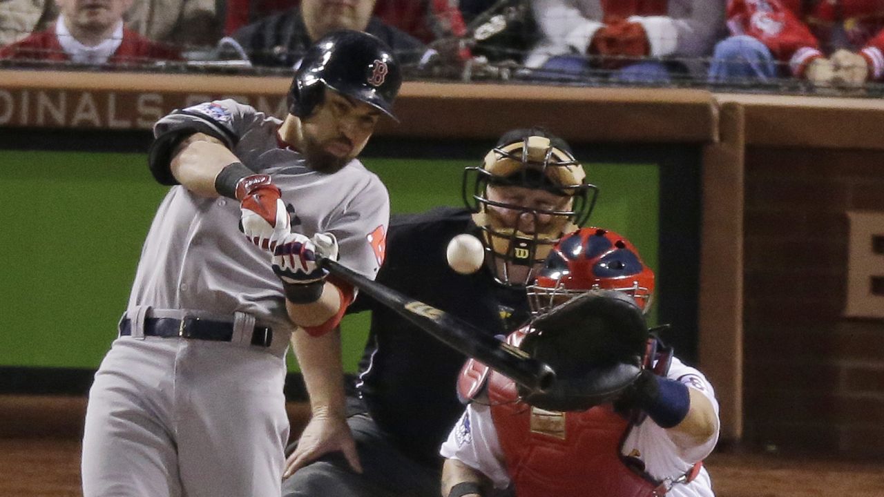 Boston Red Sox's Jacoby Ellsbury hits an RBI single during the seventh inning of Game 5 of the World Series against the St. Louis Cardinals on Monday in St. Louis.