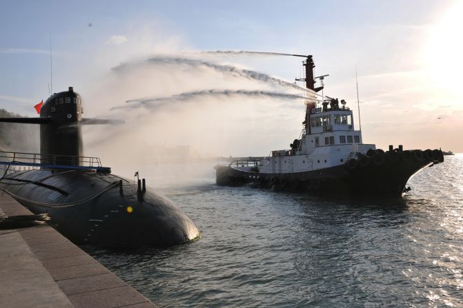 A Chinese navy nuclear submarine takes part in a nuclear safety drill at the Qingdao submarine base in east China's Shandong province on October 26, 2010. The fleet has had a remarkable safety record for more than 40 years and has gained rich experience through rigorous training and drills, its fleet commanders said.
