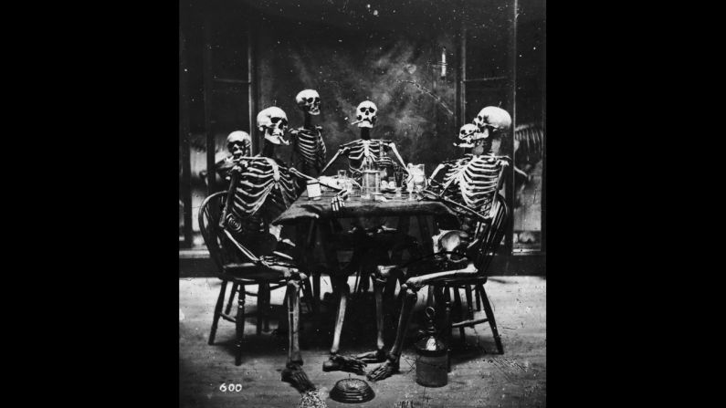 The images were originally produced in stereo. Two similar images were taken and when viewed through a special viewer, called a stereoscope, they produced a three-dimensional image. In this image from 1864, six skeletons smoke around the dinner table.