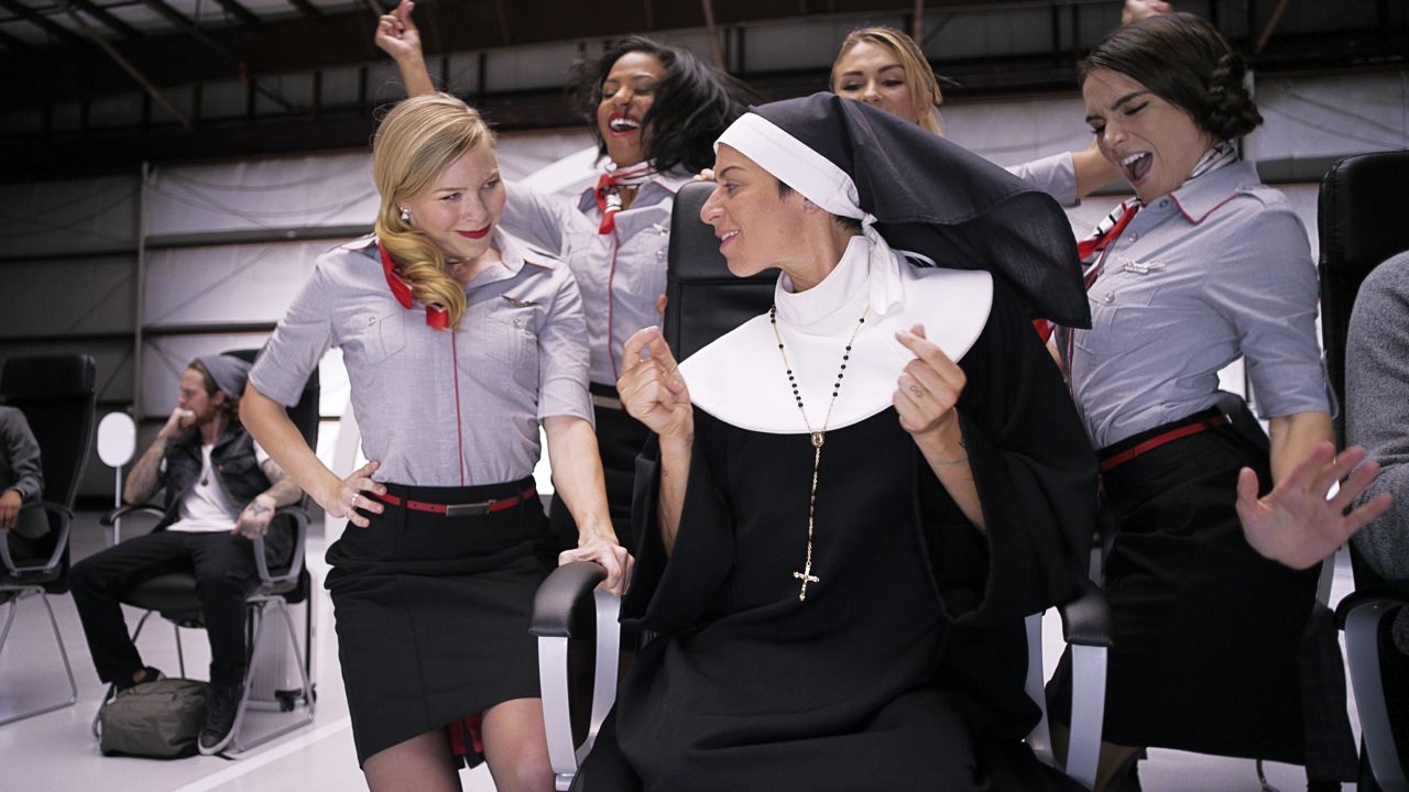 Former Olympian Tamara Campos stars as the nun, a character revived from the old Virgin America safety video.