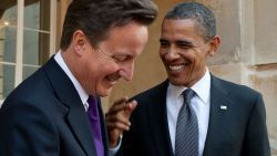 President Barack Obama talks with British Prime Minister David Cameron following their joint press conference at Lancaster House in London, England, May 25, 2011.
