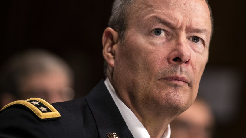 General Keith Alexander, Director of the National Security Agency, listens during a hearing of the Senate Judiciary on Capitol Hill October 2, 2013 in Washington, DC.