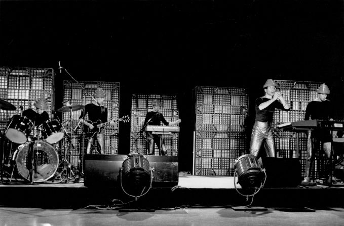 With a name inspired by the concept of de-evolution, Mark Mothersbaugh and Jerry Casale brought on their brothers, each named Bob, and Alan Myers to form Devo, seen here performing in Los Angeles around 1979. Although they never quite managed to maintain the mainstream success found with 1980's "Whip It!" Devo's status as an important cult pop/rock group hasn't wavered through its various incarnations.