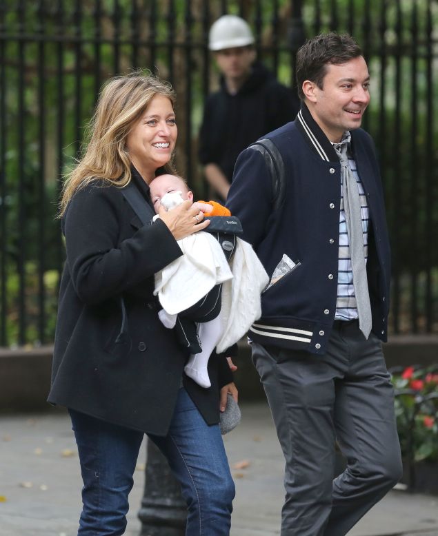 Jimmy Fallon and his wife step out with infant daughter Winnie. 