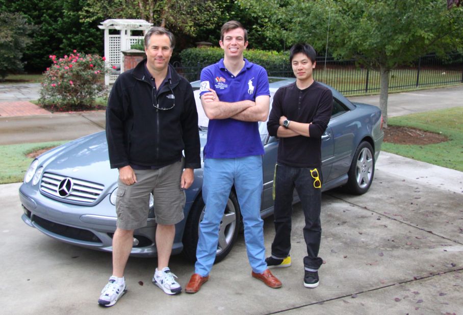 Dave Black, Ed Bolian and Dan Huang pose in front of the car they would use to attempt to break the record. Bolian is the leader and main driver, Black acted as the co-driver and Huang was the team's spotter -- keeping an eye on the car's considerable technology while looking out for obstacles. 