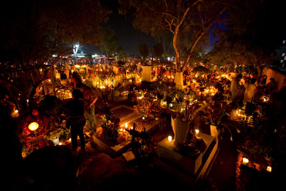 "Some choose to go to the grave site of the loved one instead of building an altar," says Mexican-American writer Kathy Cano-Murillo,  owner of Crafty Chica in Phoenix, Arizona. "Family and friends bring candles which are turned off to symbolize the end of their journey to our world."