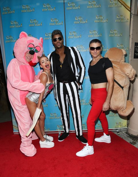 Kelly Ripa, second from left, channeled a really good Miley Cyrus here with, from left, Art Moore, Michael Strahan and Michael Gelman at the "LIVE With Kelly and Michael: Best Halloween Show Ever in New York.  