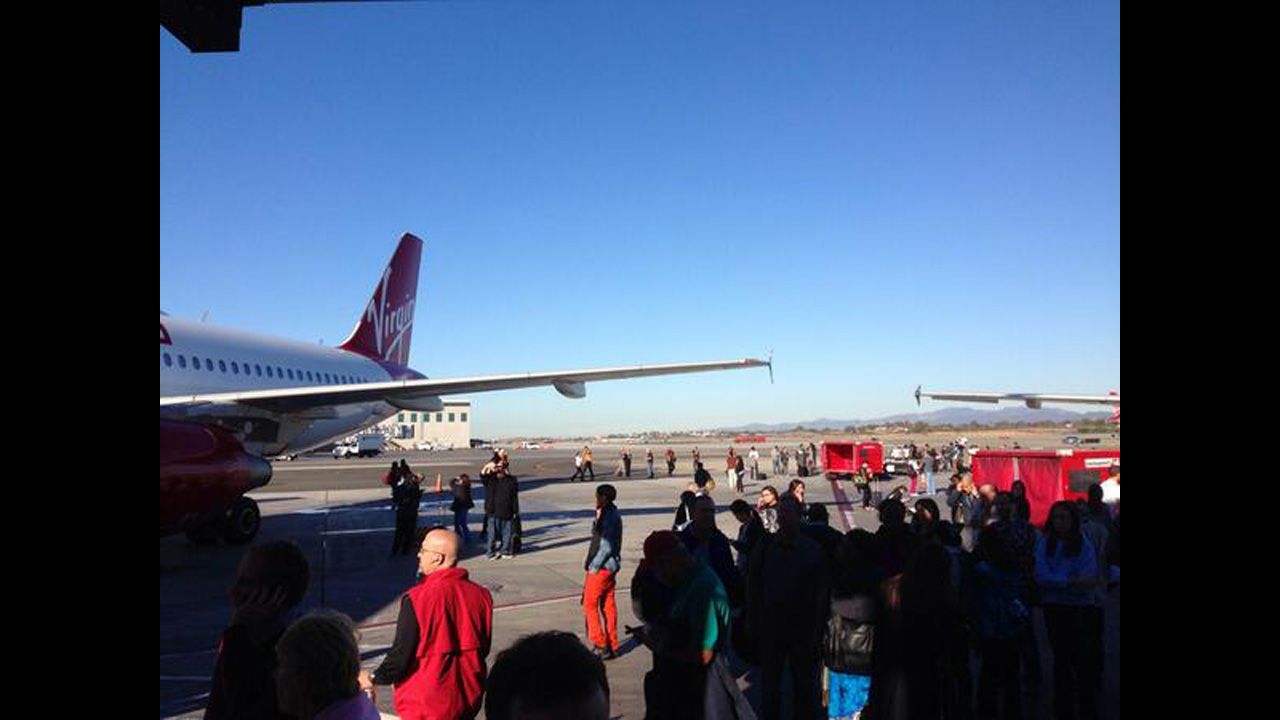 The gunfire reports led to a "ground stop" for arriving planes, said police and the Federal Aviation Administration.