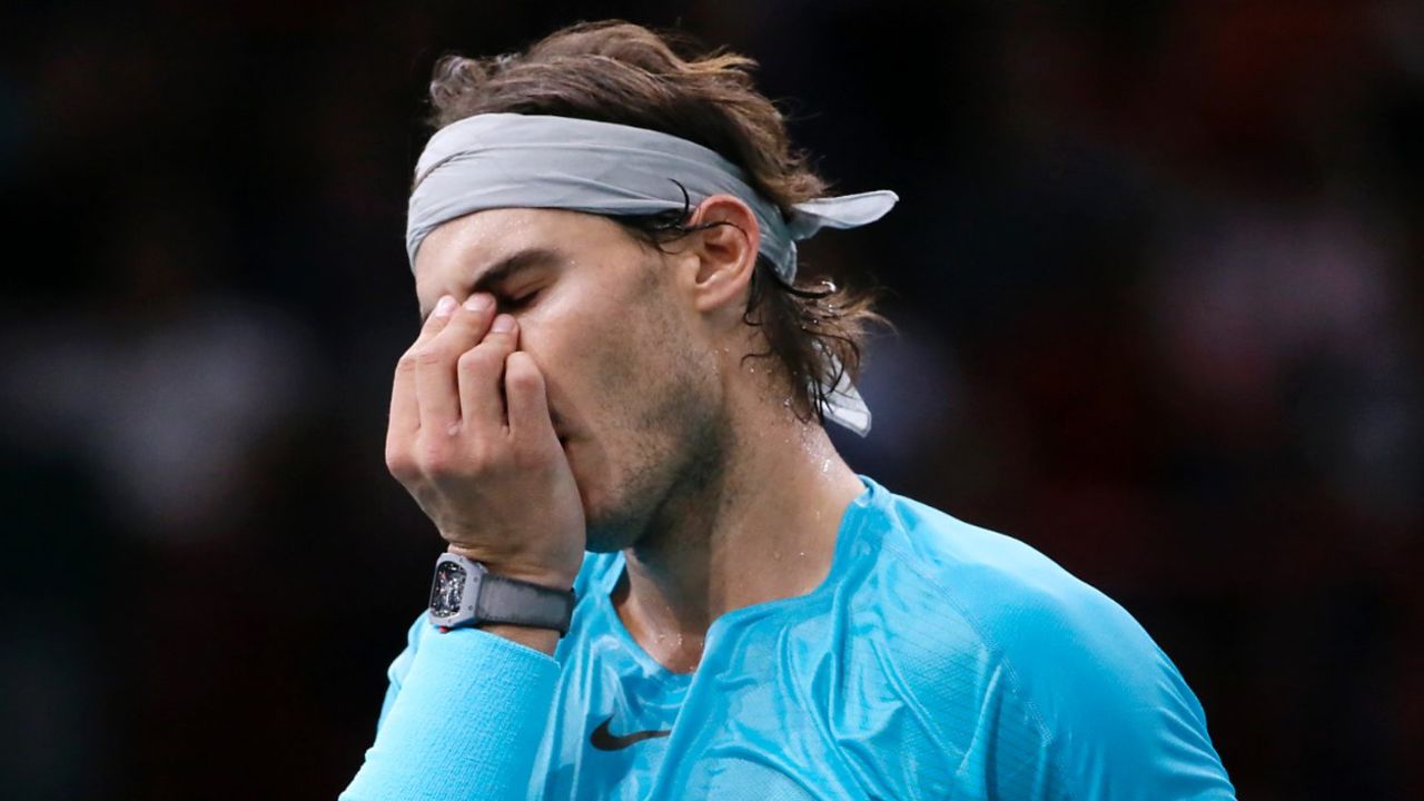 Spain's Rafael Nadal reacts after a point during a semi final match at the ninth and final ATP World Tour Masters 1000 indoor tennis tournament on November 2, 2013 at the Bercy Palais-Omnisport (POPB) in Paris. AFP PHOTO / KENZO TRIBOUILLARD (Photo credit should read KENZO TRIBOUILLARD/AFP/Getty Images)